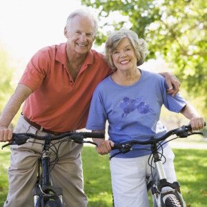 Picture of Senior Couple Riding Bikes - RFI Masters Medicare Supplemental Insurance